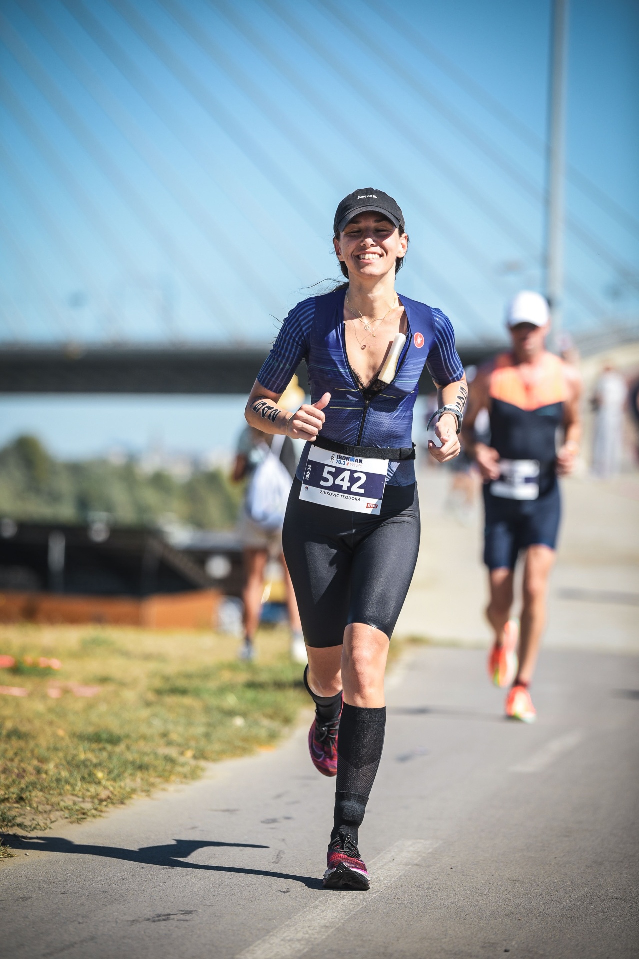 Teodora running an Ironman race