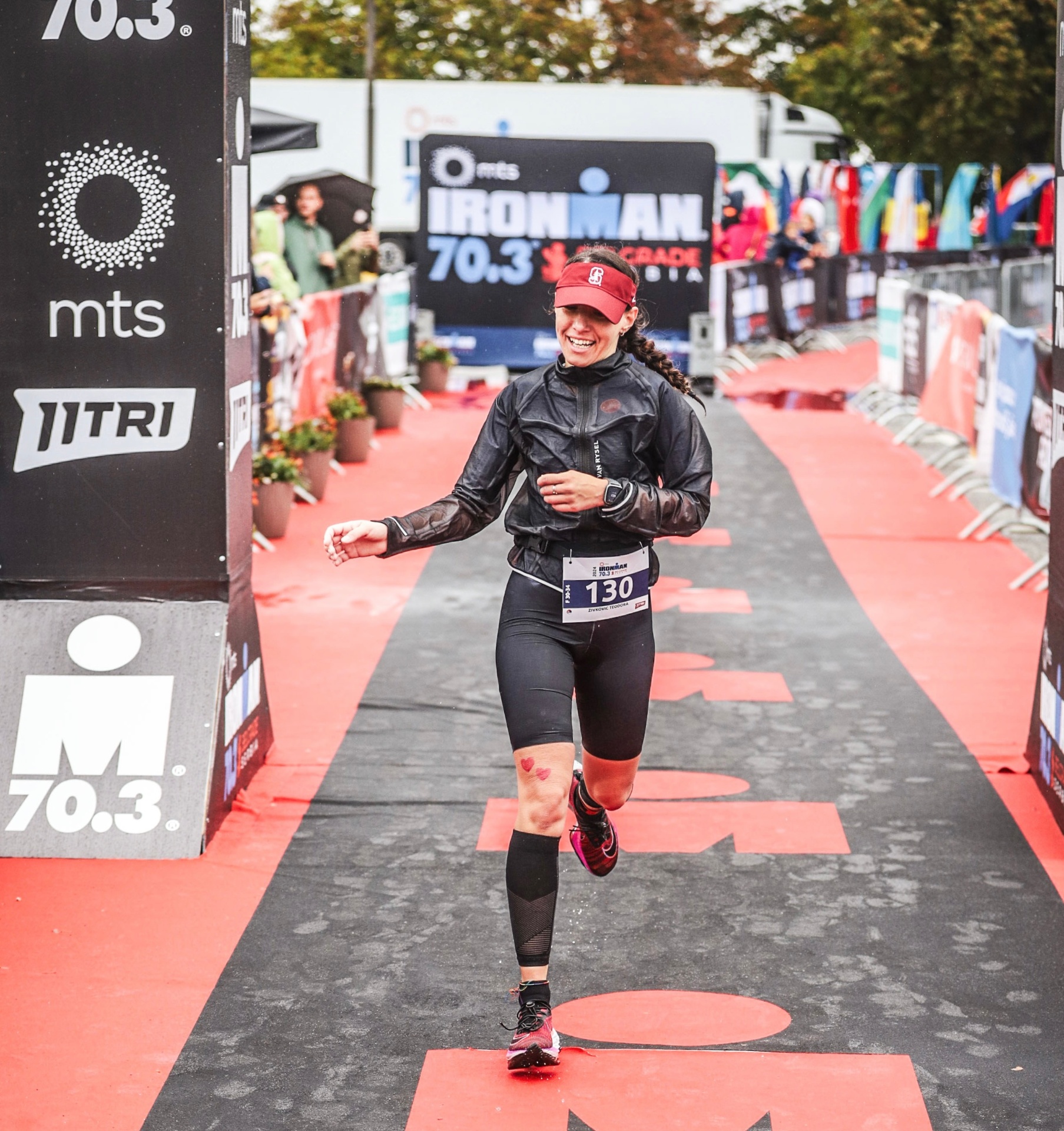 Teodora finishing Ironman 70.3